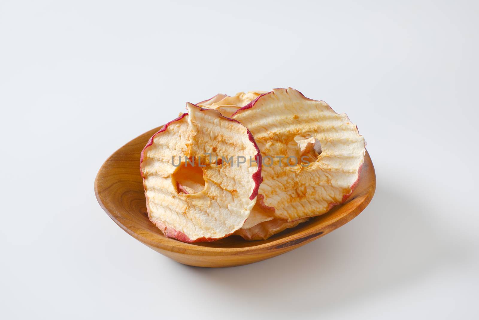 Bowl of dried apple slices - apple chips or rings