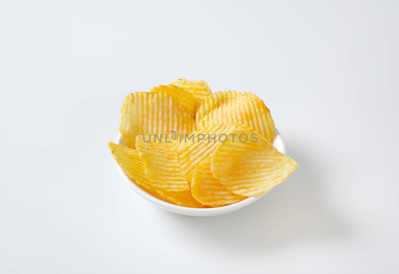 Ridged potato chips by Digifoodstock