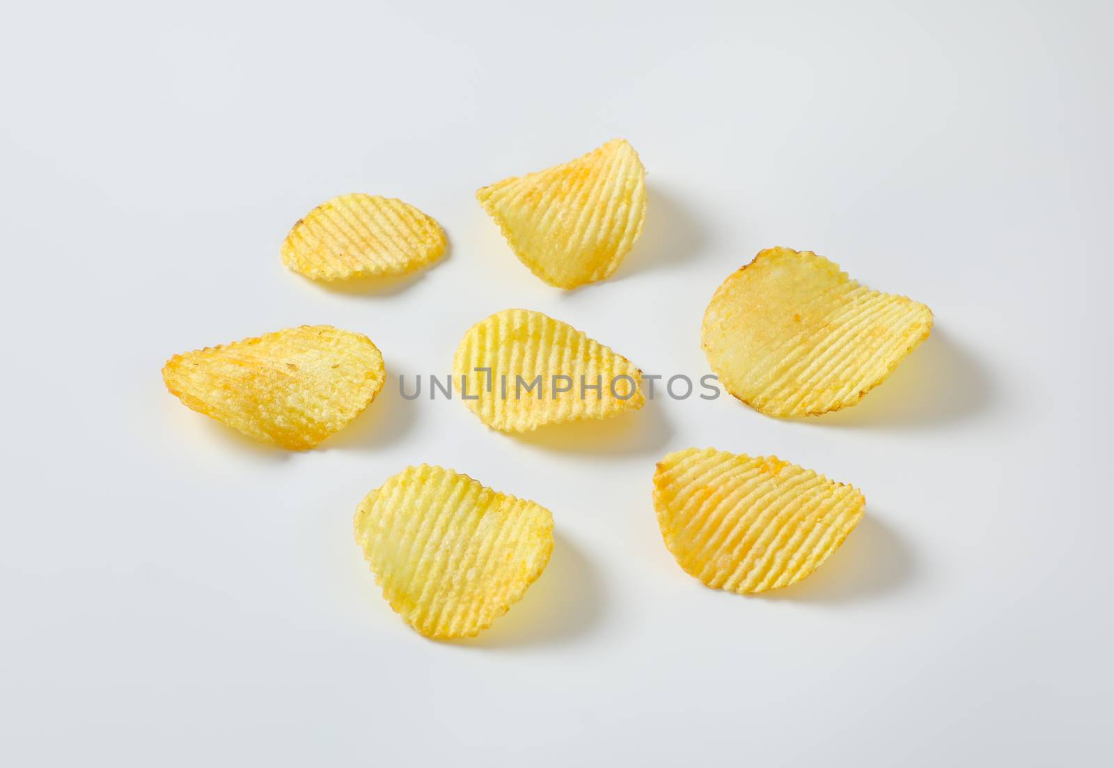 Six thin ridged potato chips