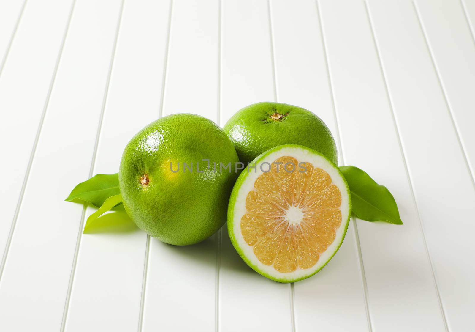 Sweetie fruits (green grapefruits, pomelits) by Digifoodstock