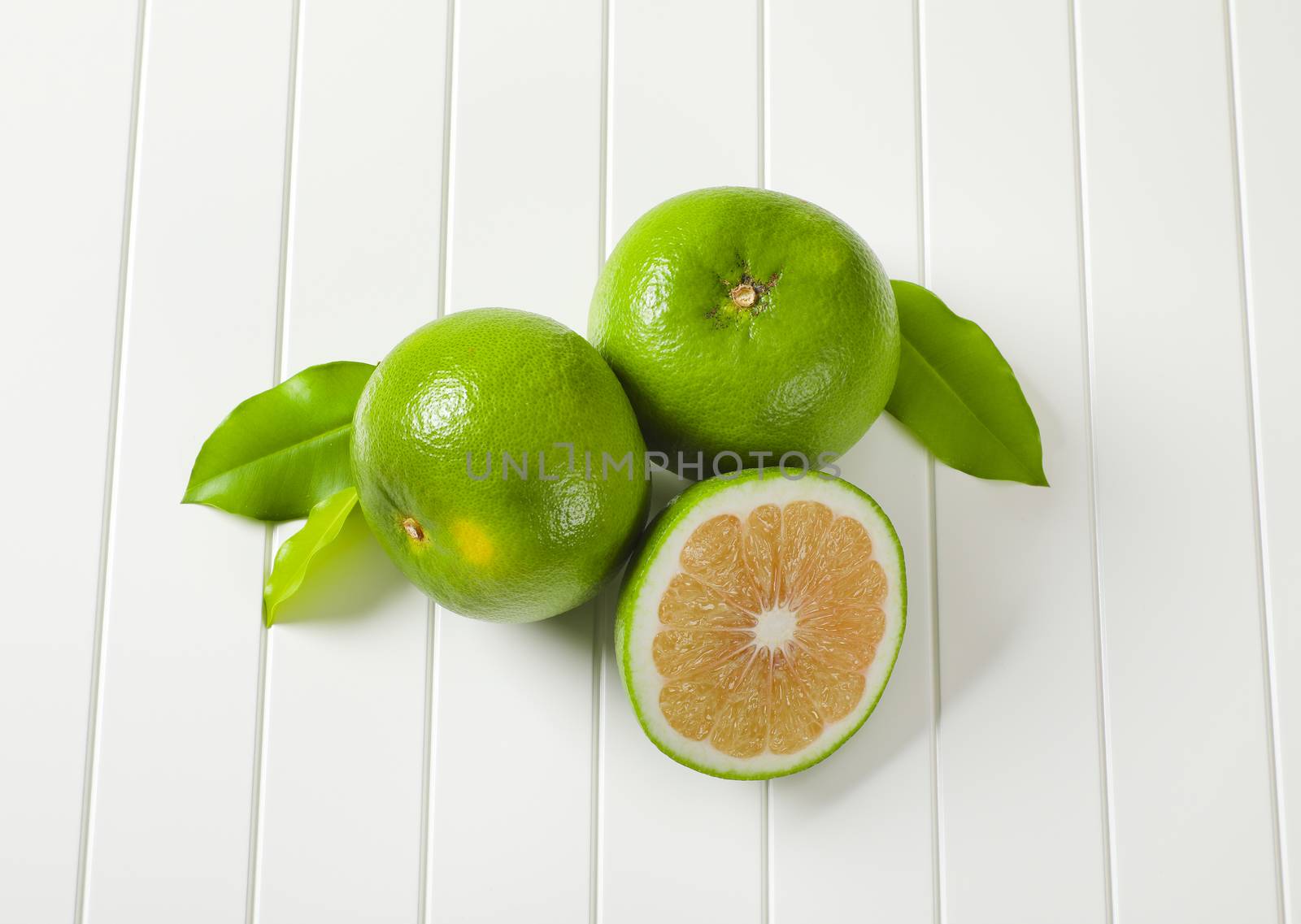 Sweetie fruits (green grapefruits, pomelits) by Digifoodstock