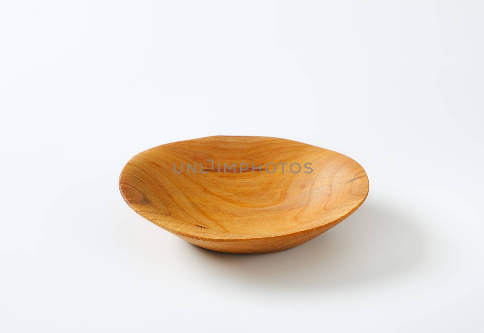 Empty oval shaped natural wood bowl