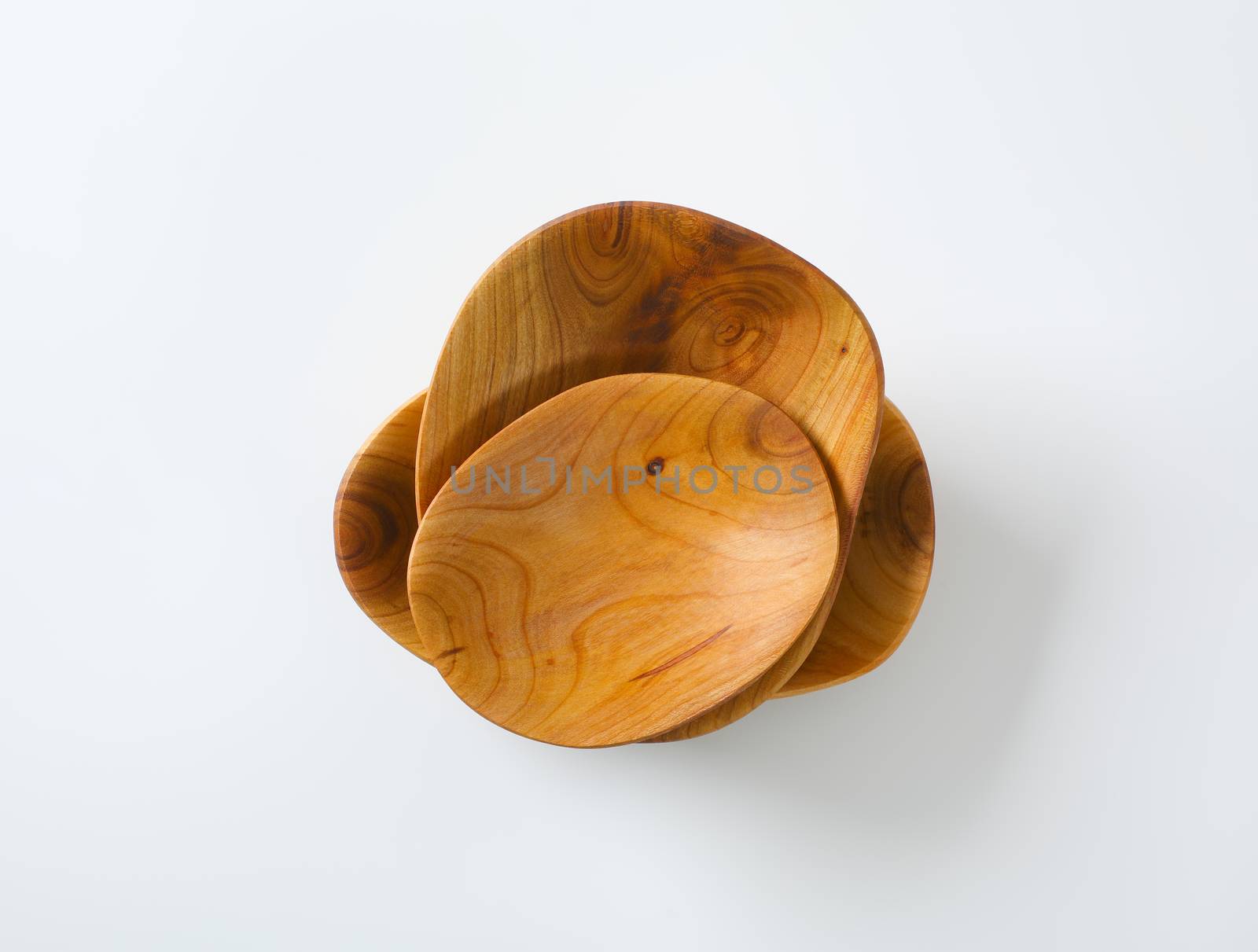 Empty handcrafted natural wood bowls