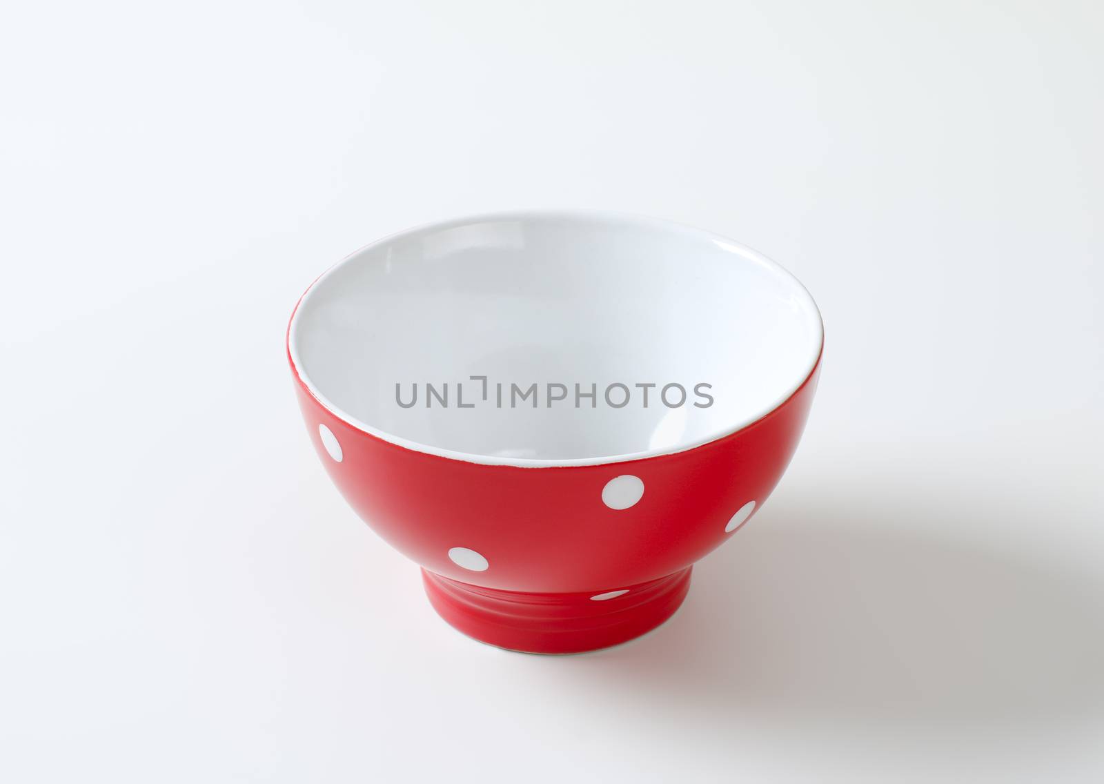 Empty red and white polka dot bowl by Digifoodstock