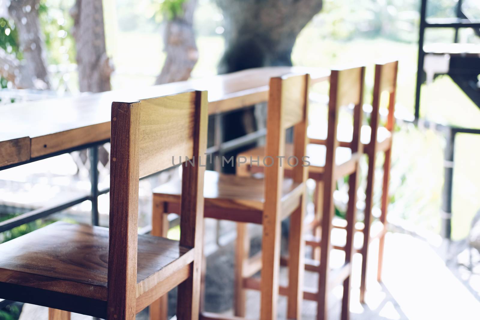 wooden chair on terrace in cafe coffee shop restaurant