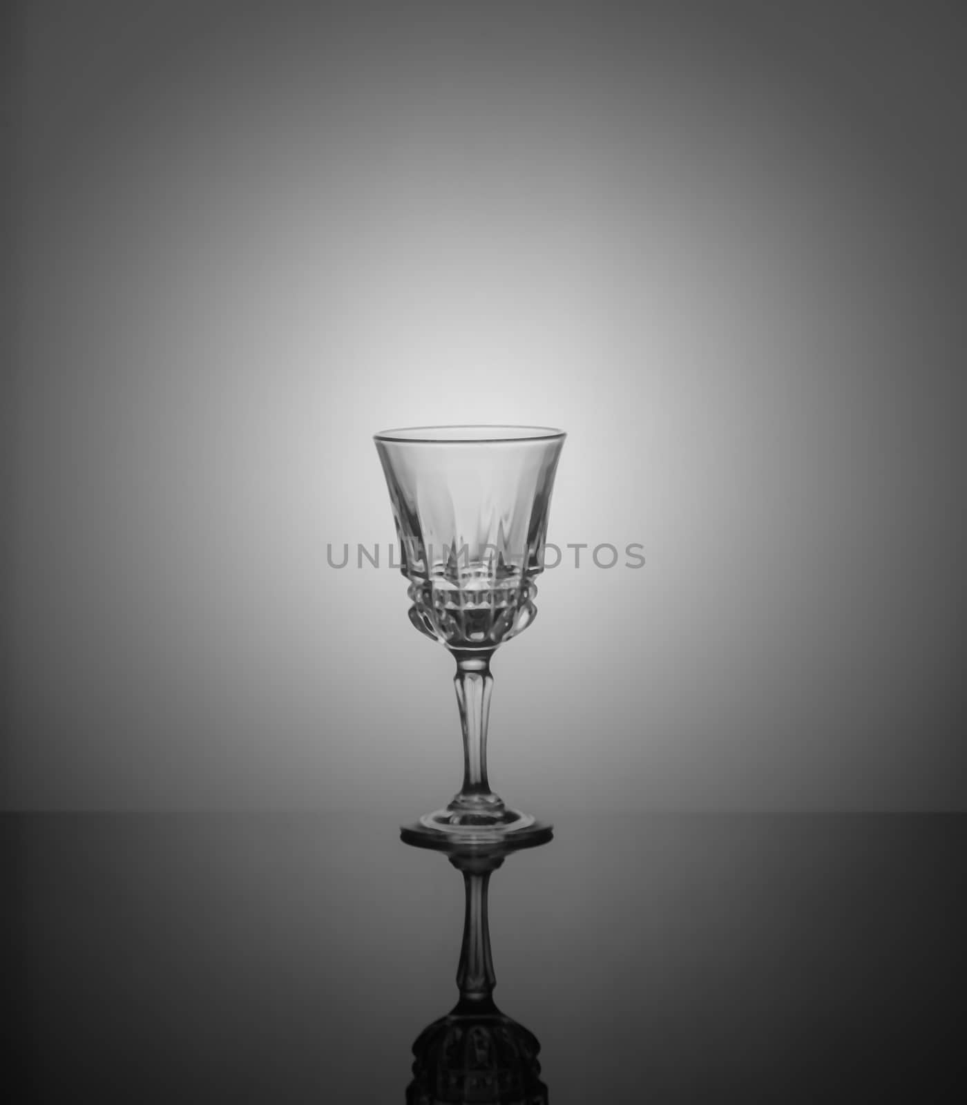 .empty drink glasses on dark background with back light.