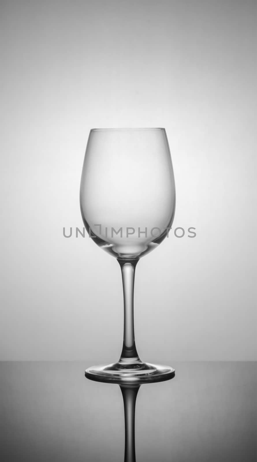 .empty drink glasses on dark background with back light.