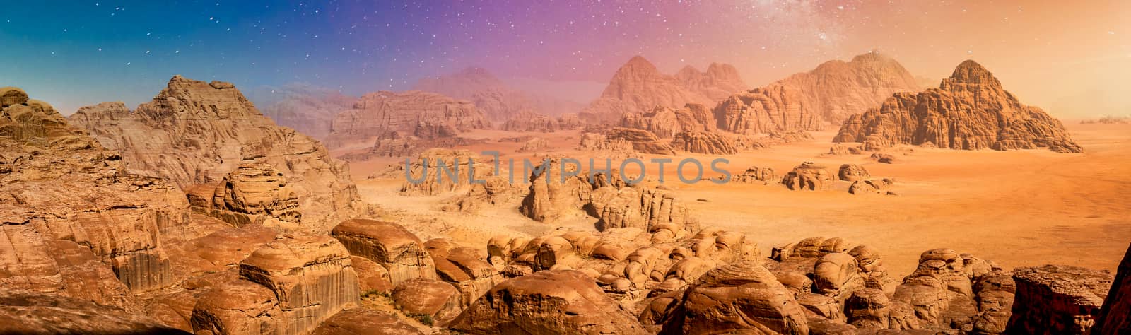 Desert and rocks on extraterrestrial or alien planet in the universe with view on space and galaxy. Sci-fi.