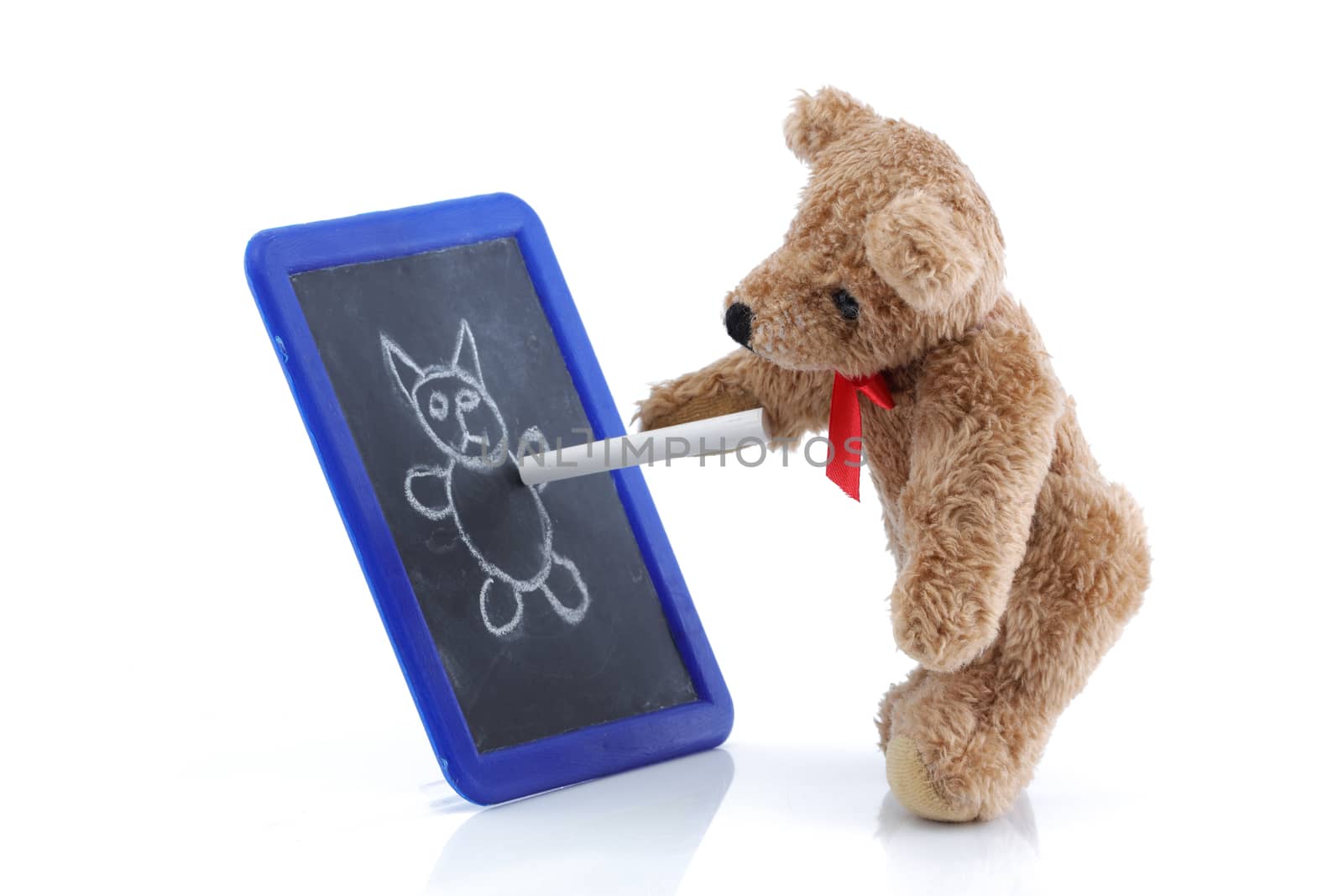 A cute teddy bear drawing on a chalk board