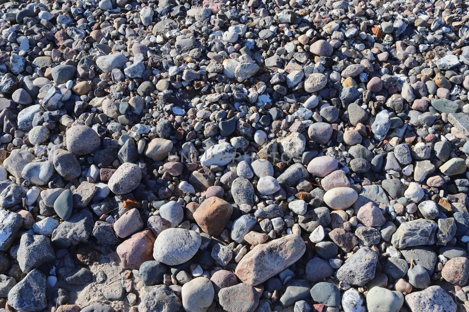 Beautiful stone pebbles at the beach of the baltic sea in the no by MP_foto71