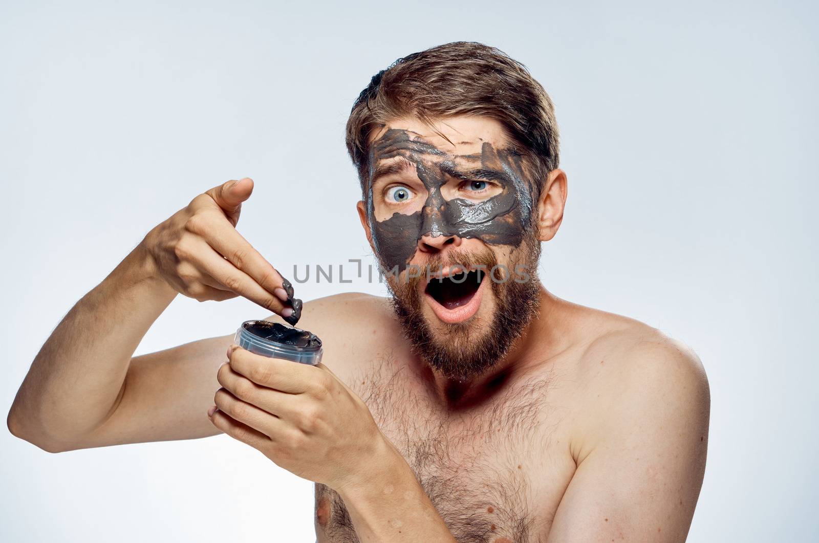 Man in black mask on face clean skin lifestyle naked shoulders hygiene health by SHOTPRIME