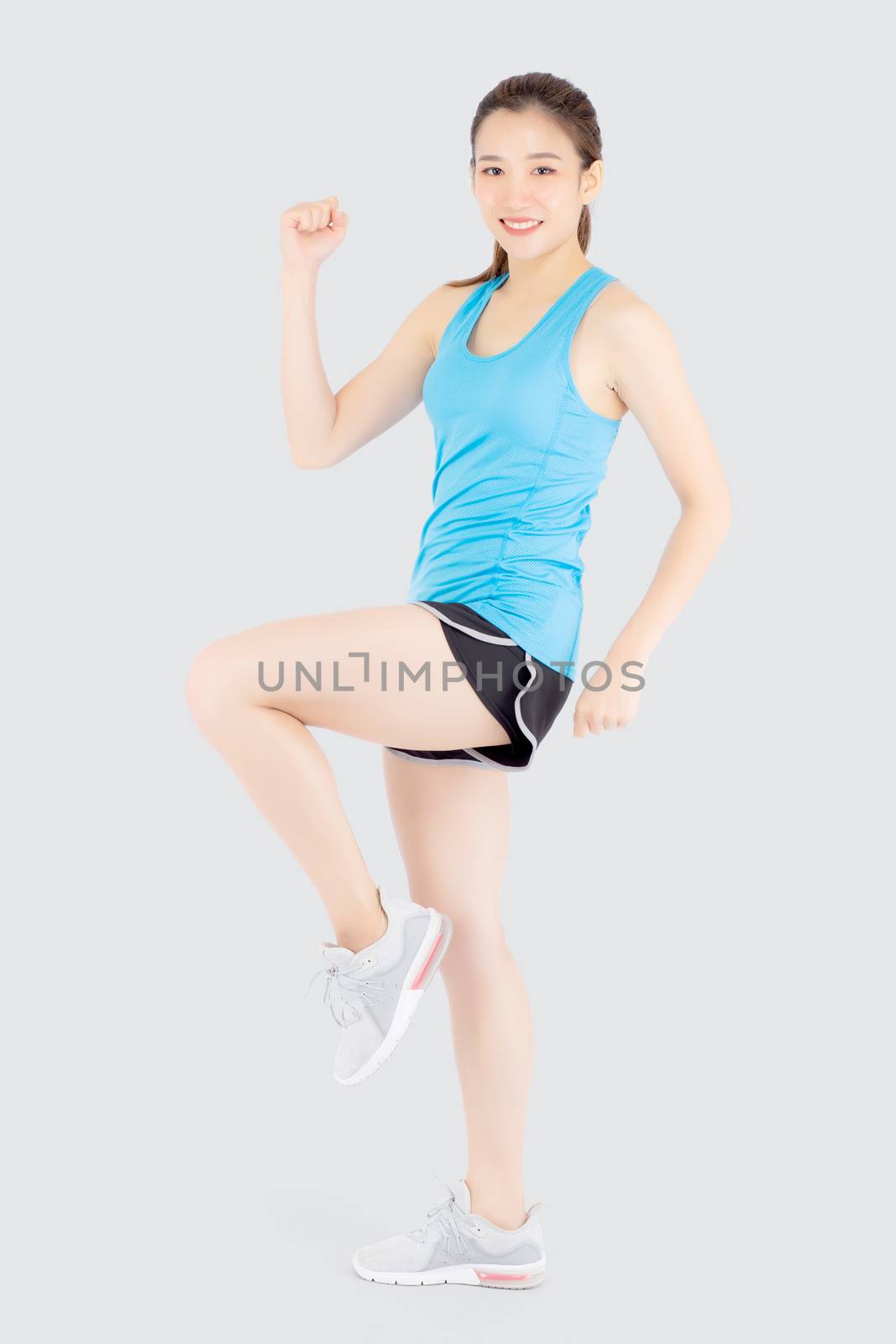 Beautiful portrait young asian woman in sport clothes cheerful with satisfied and confident isolated on white background, asia girl have shape and wellness, exercise for fit with health concept.