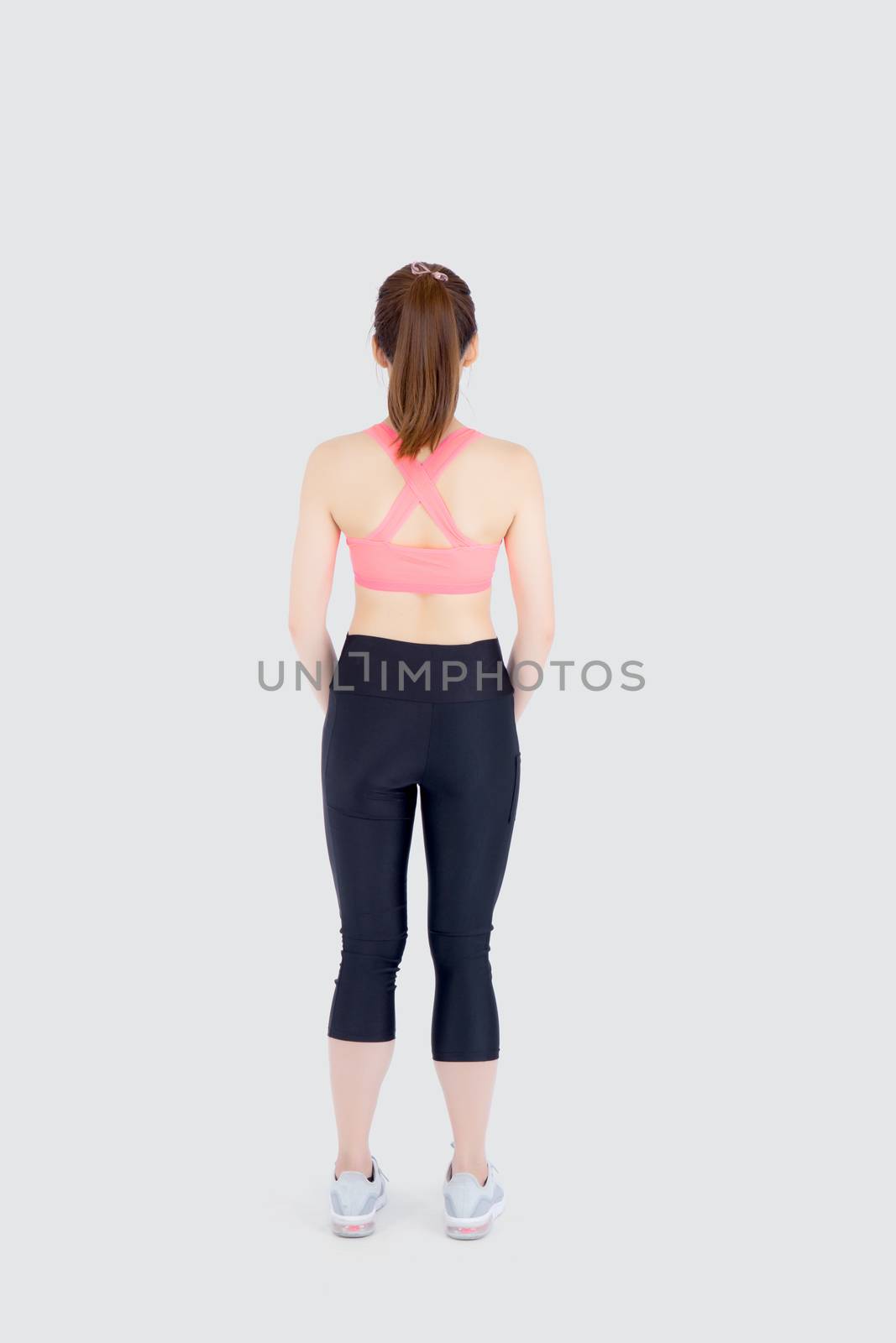 Beautiful portrait young asian woman in sport clothing with satisfied and confident isolated on white background, back of girl asia have shape and wellness, exercise for fit with health concept.