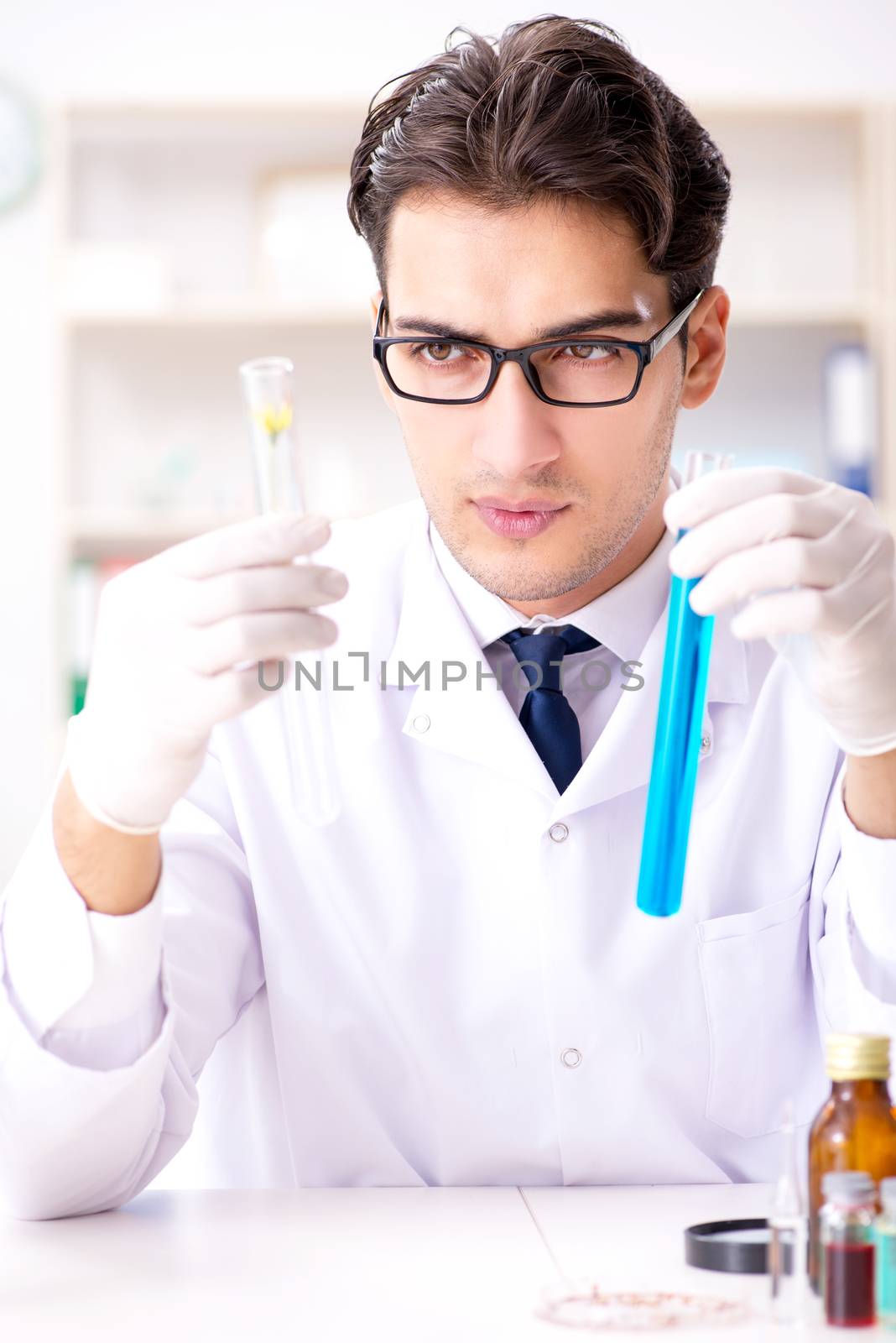 Biotechnology scientist chemist working in lab