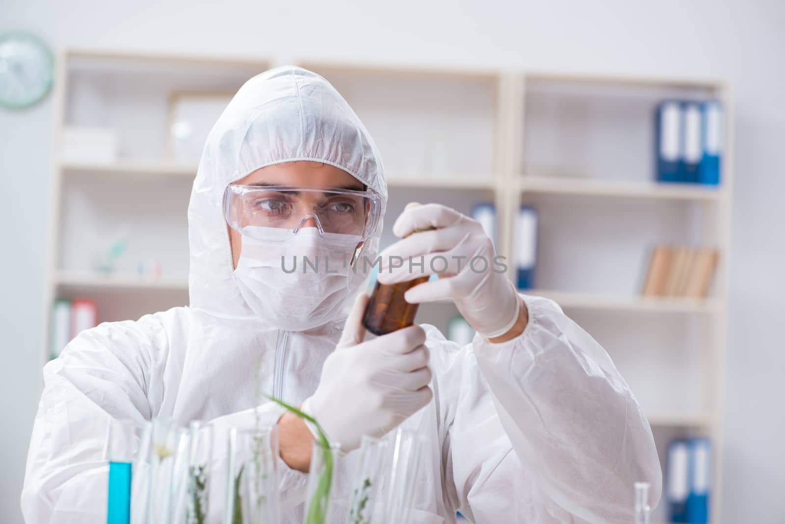 Biotechnology scientist chemist working in lab