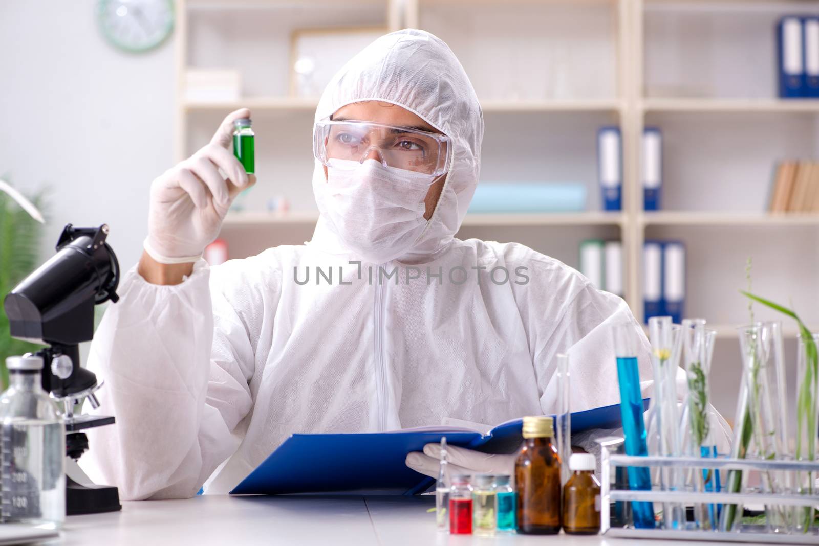 Biotechnology scientist chemist working in lab