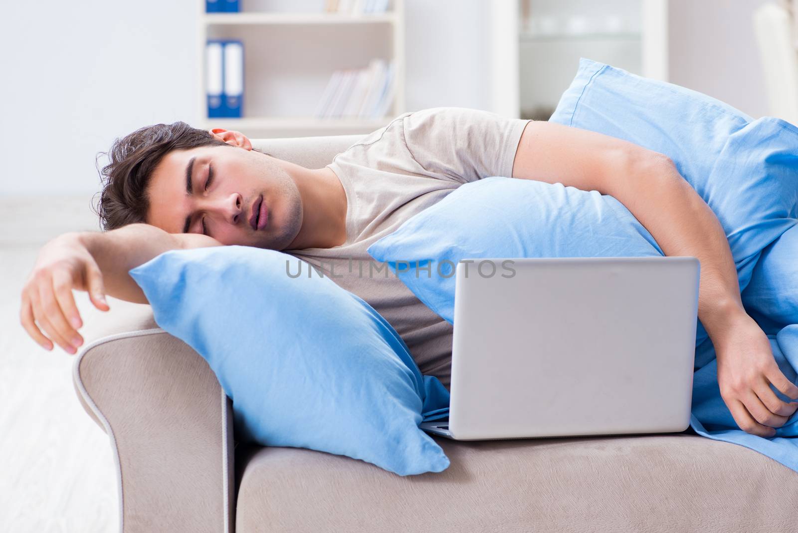 Man working late at his laptop at home