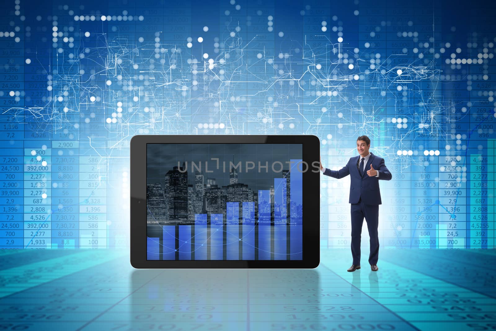 Businessman standing next to tablet computer in business concept