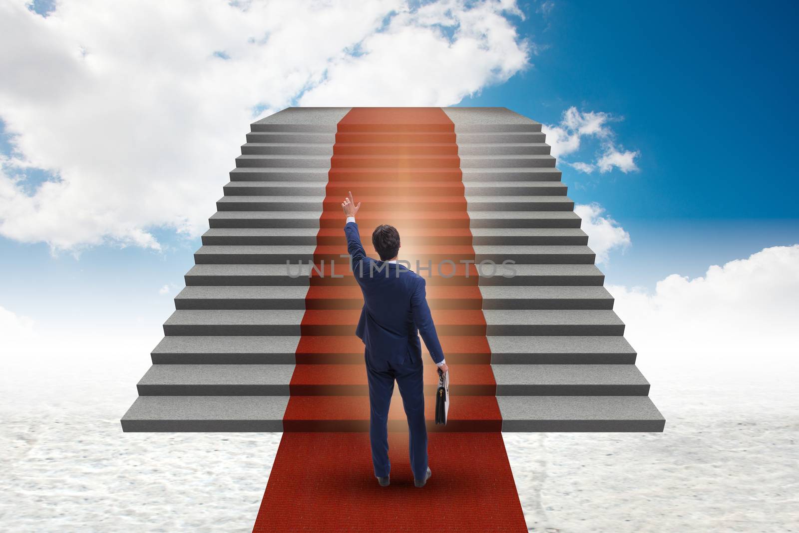 Young businessman climbing stairs and red carpet into sky