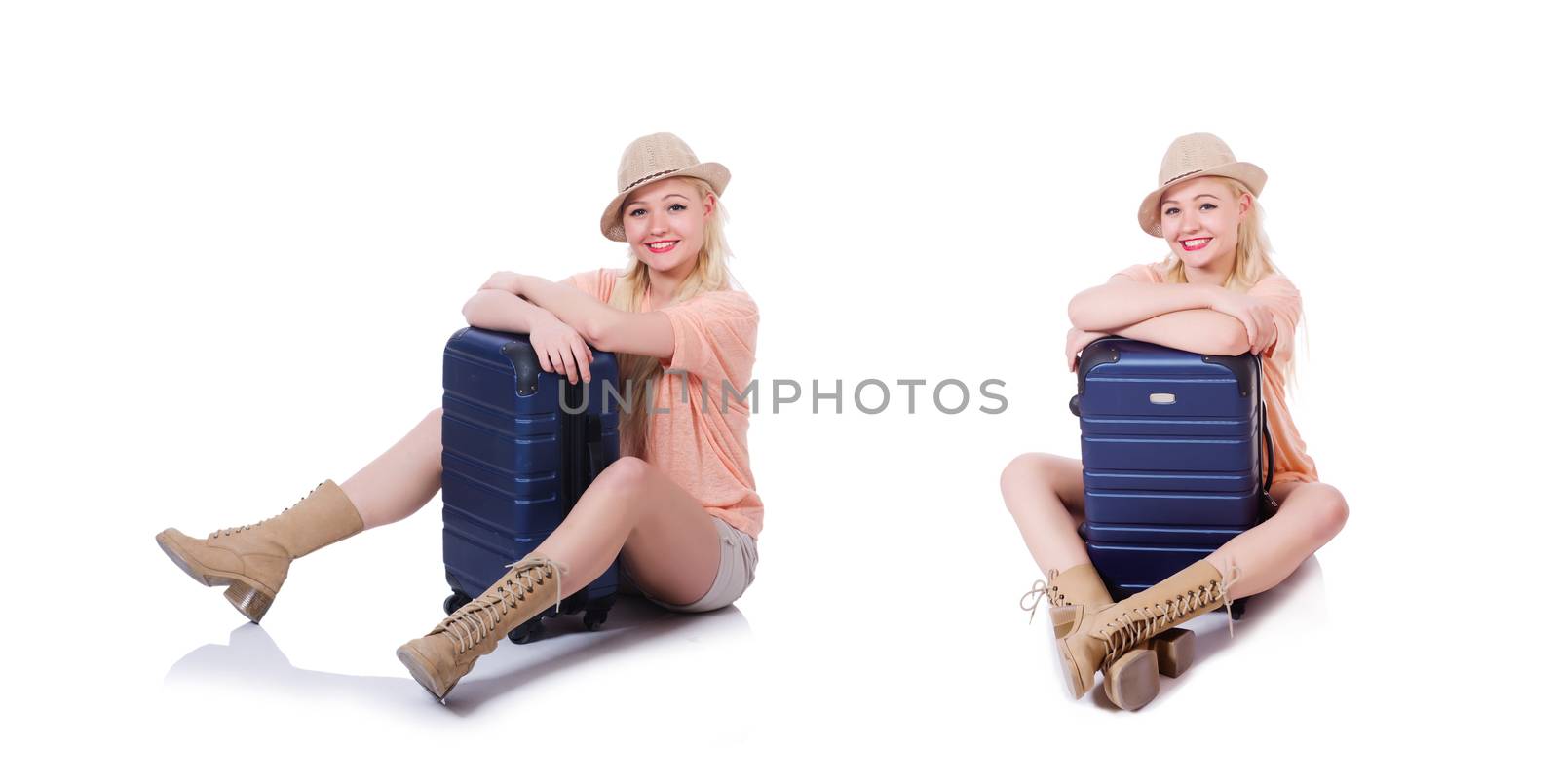 Young woman with suitcase ready for beach holiday