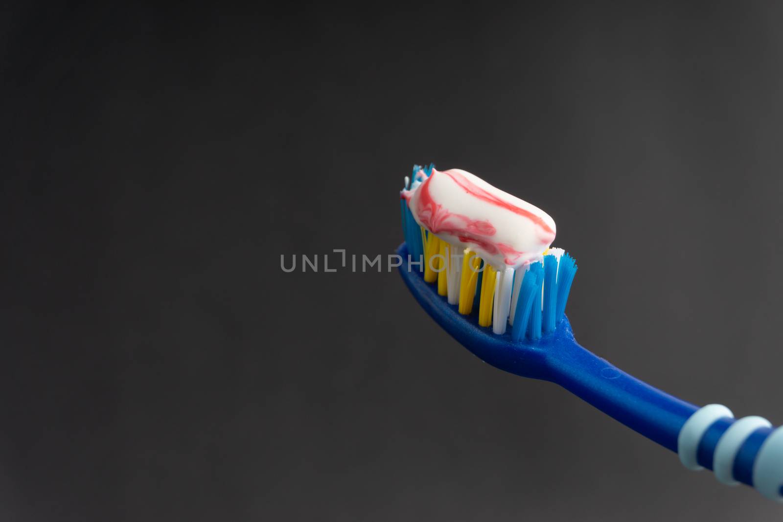 Toothbrush closeup on white background. Healthy concept by silverwings