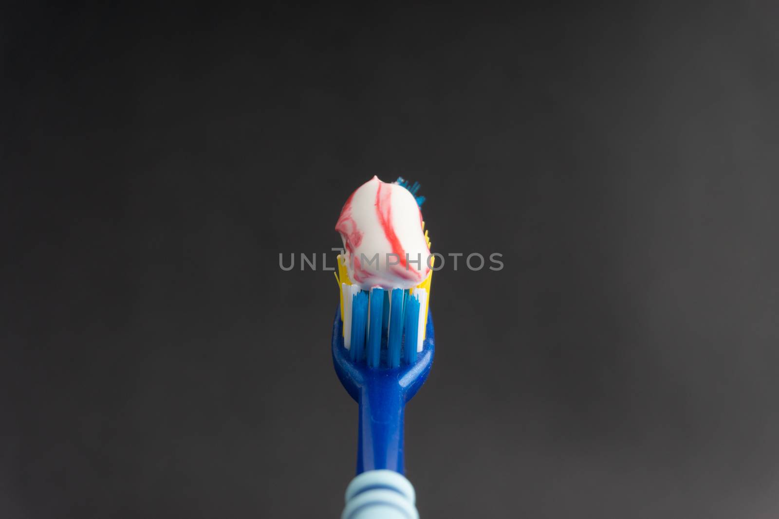 Toothbrush closeup on white background. Healthy concept