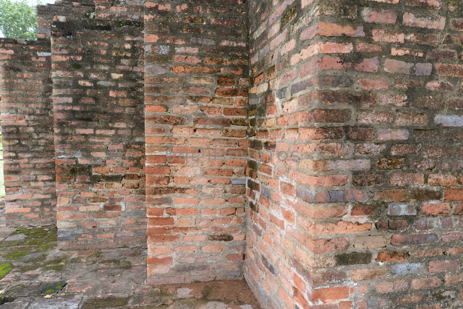 Dirty and ruins vintage brown brick wall background.