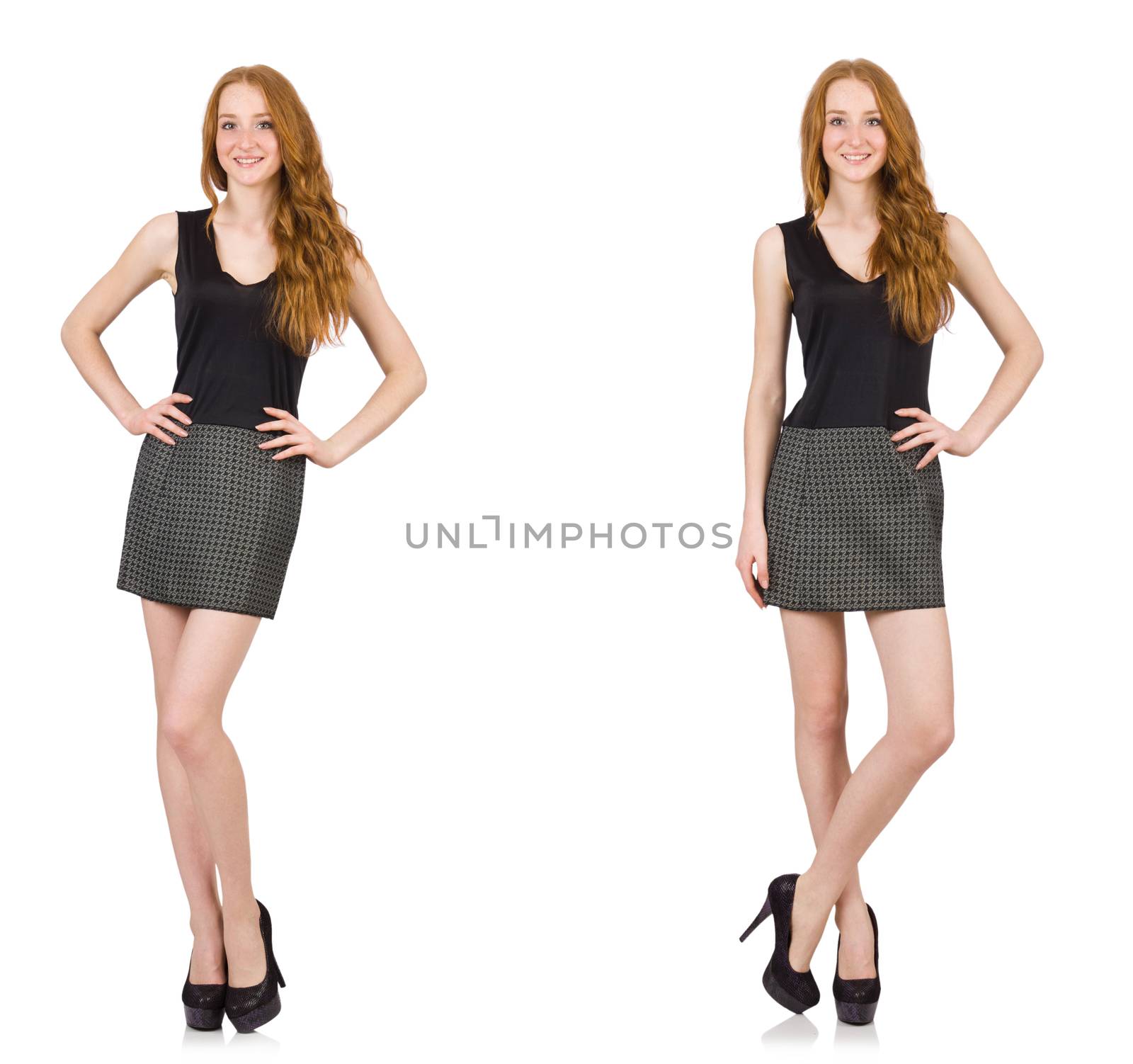 Red hair girl in gray dress isolated on white