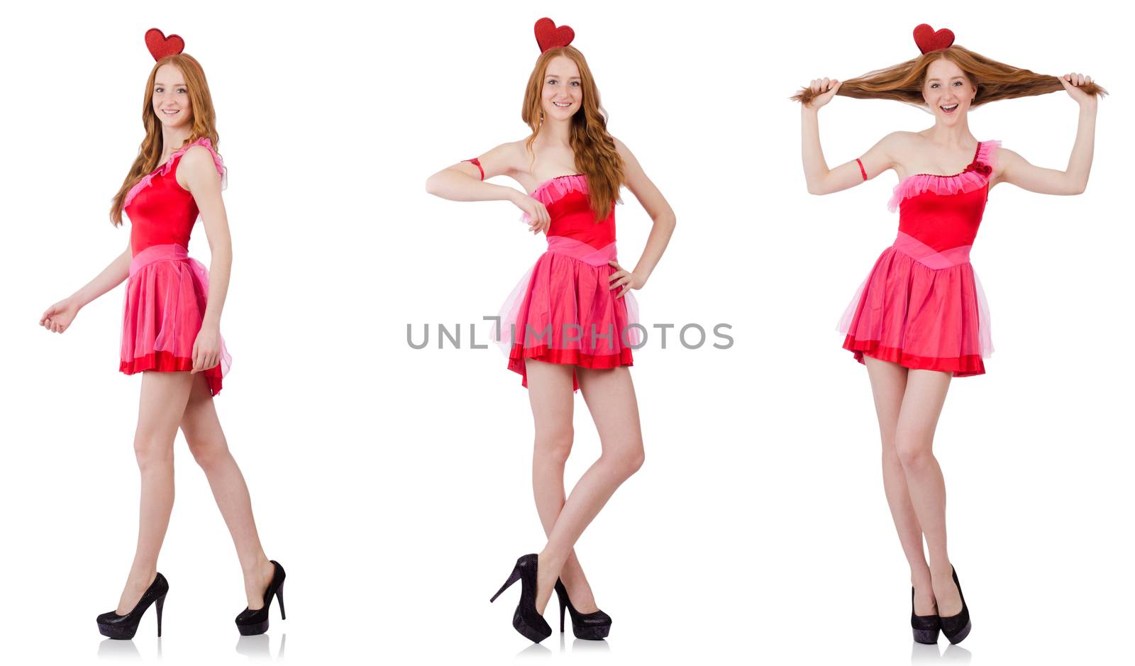 Pretty young model in mini pink dress isolated on white