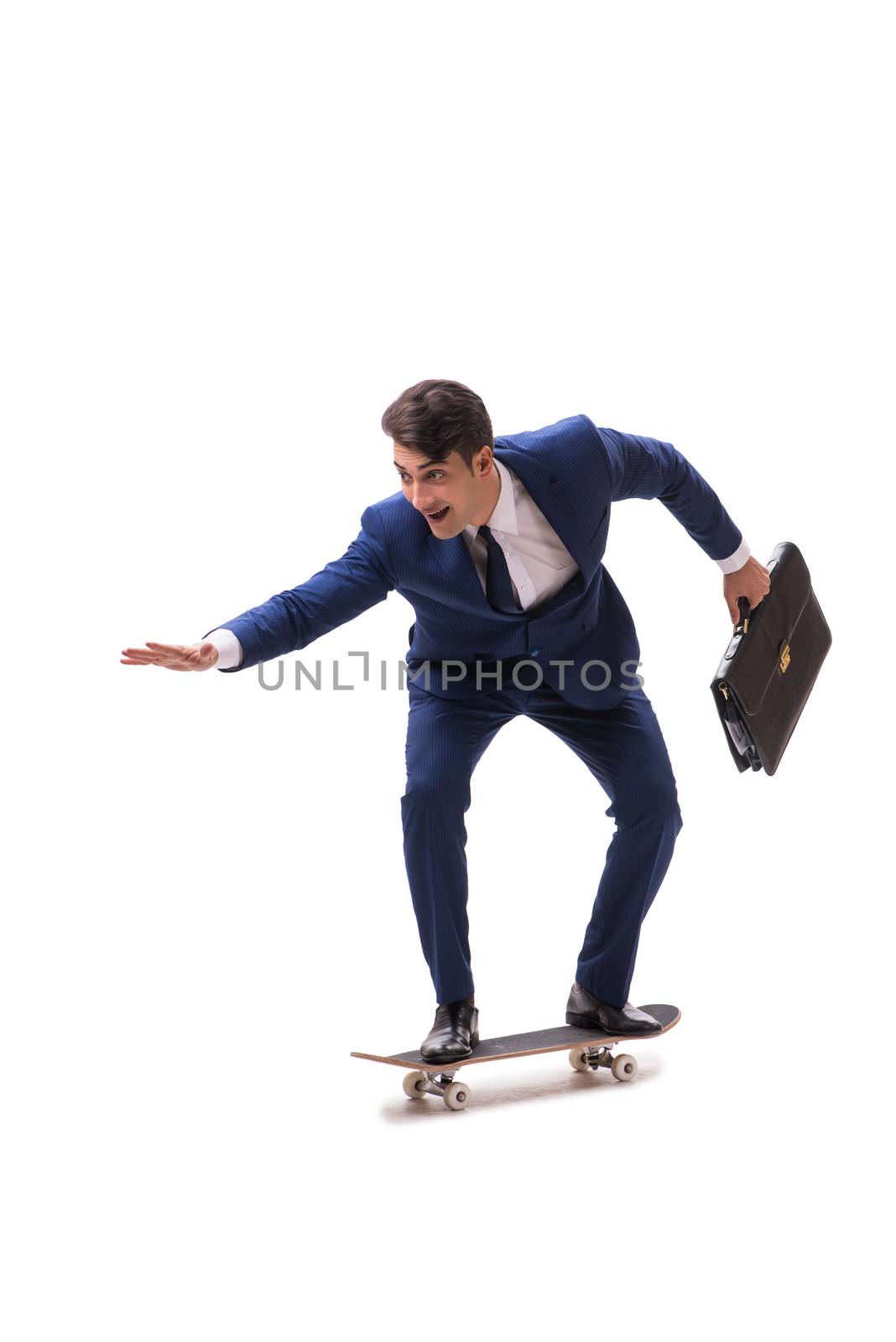 Businessman riding skateboard isolated on white background