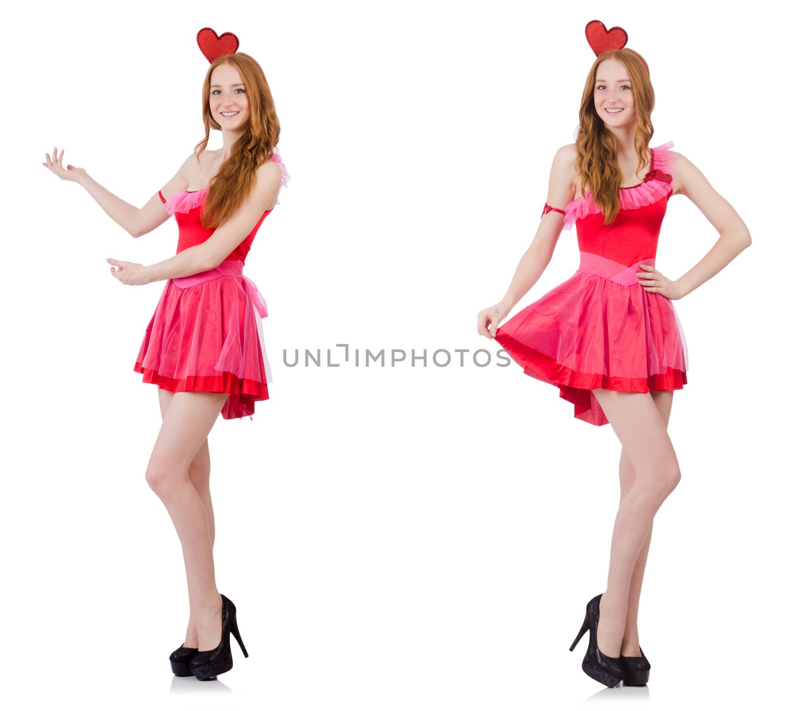 Pretty young model in mini pink dress isolated on white