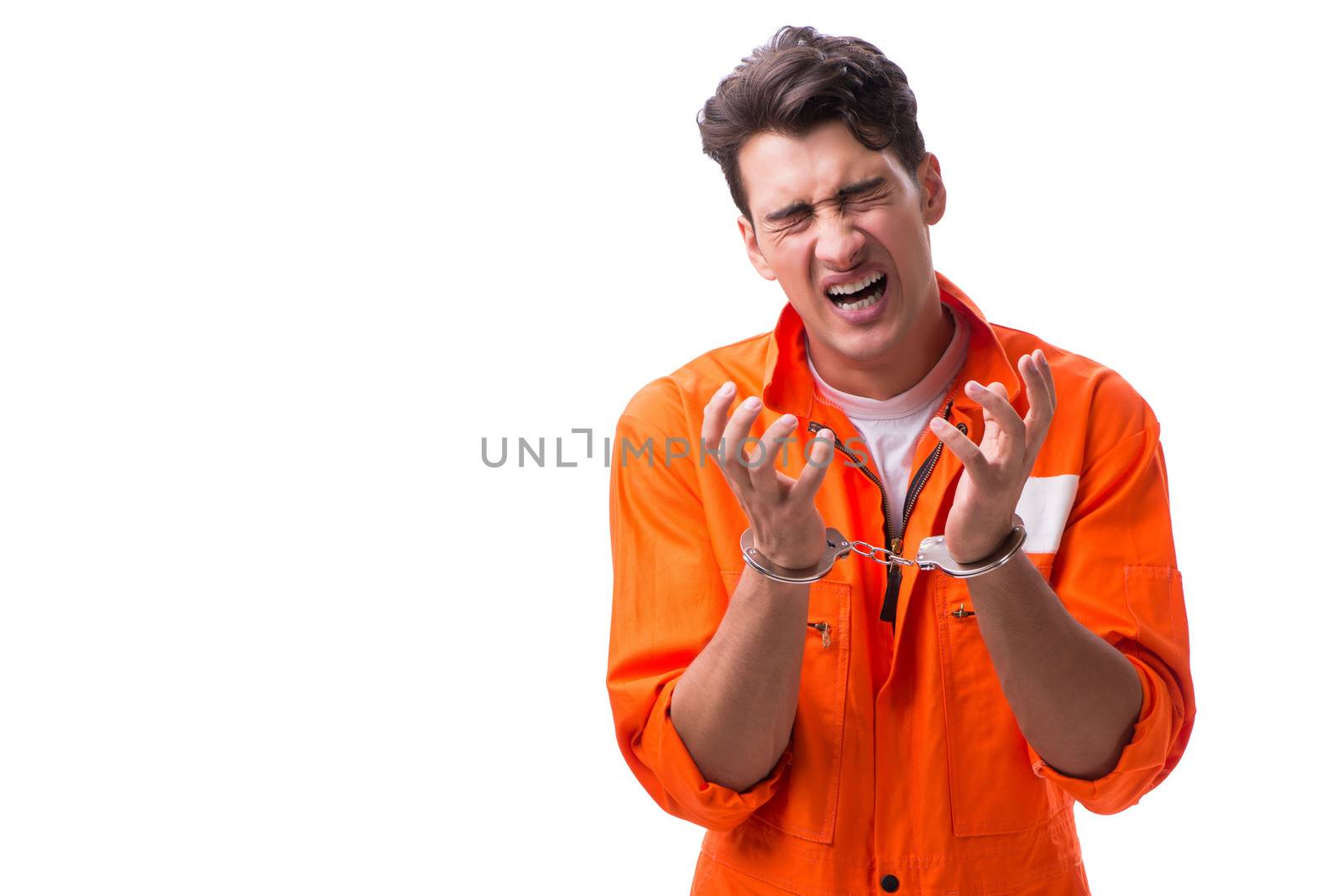 Handcuffed handsome businessman isolated on white background