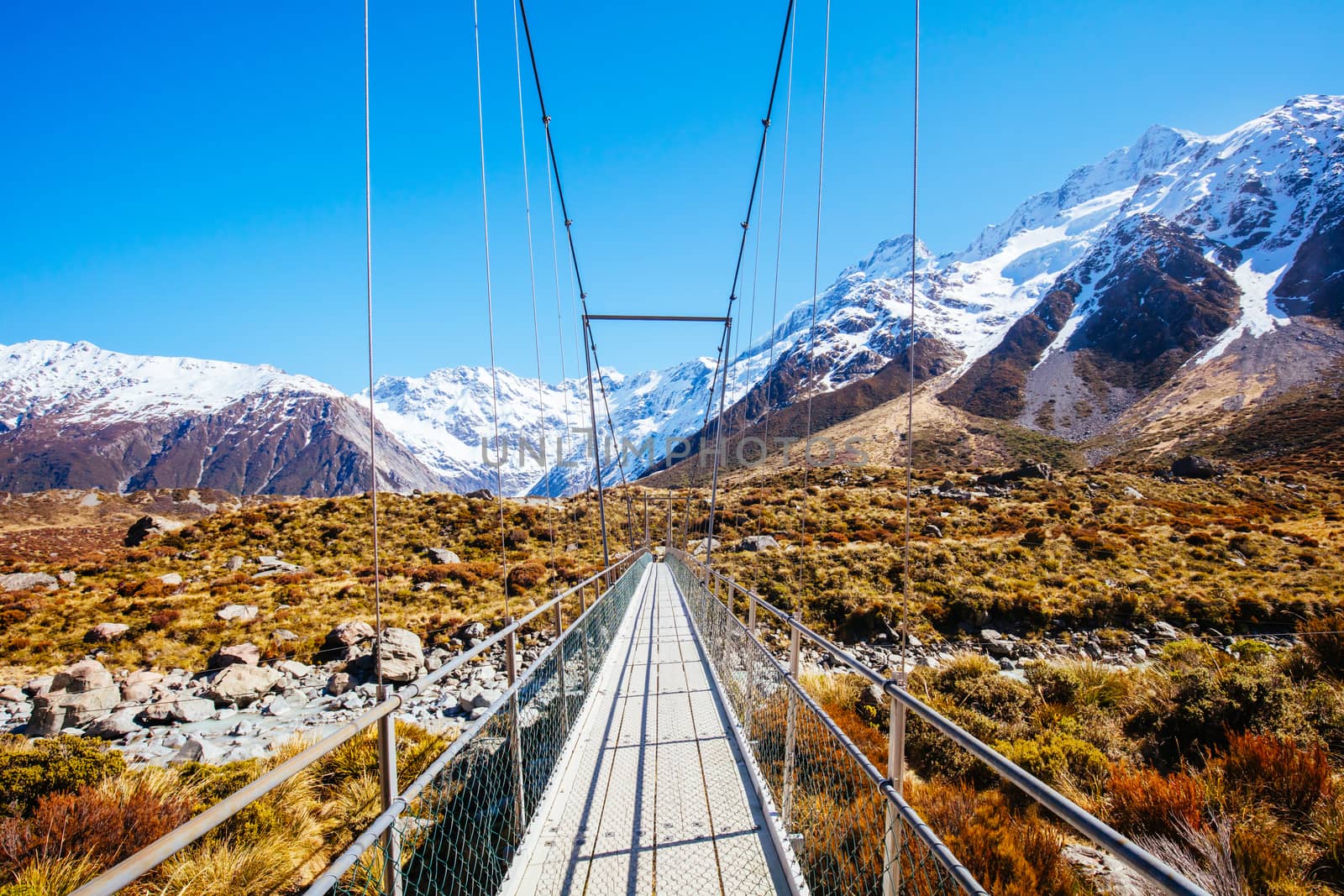 The iconic half day world famous Hooker Valley Track hike at Mt Cook in New Zealand