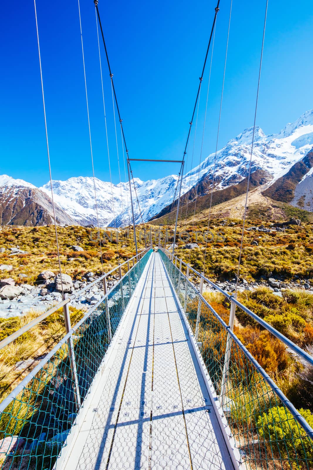 The iconic half day world famous Hooker Valley Track hike at Mt Cook in New Zealand