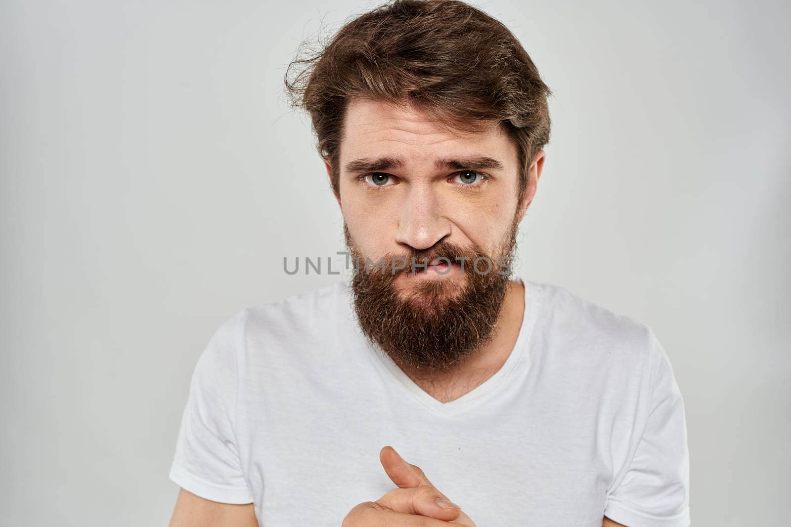 emotional bearded man close-up facial expression studio lifestyle by SHOTPRIME