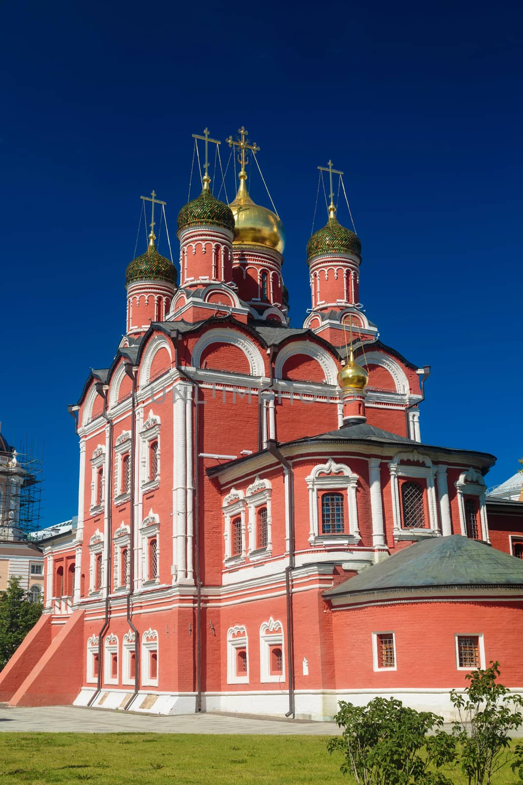 Facade of red brick Christian cathedral building in Moscow by galinasharapova