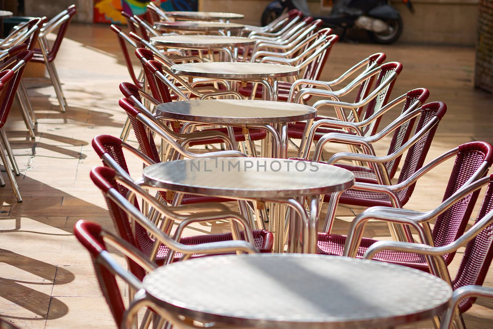 Various bar tables emptied by the pandemic