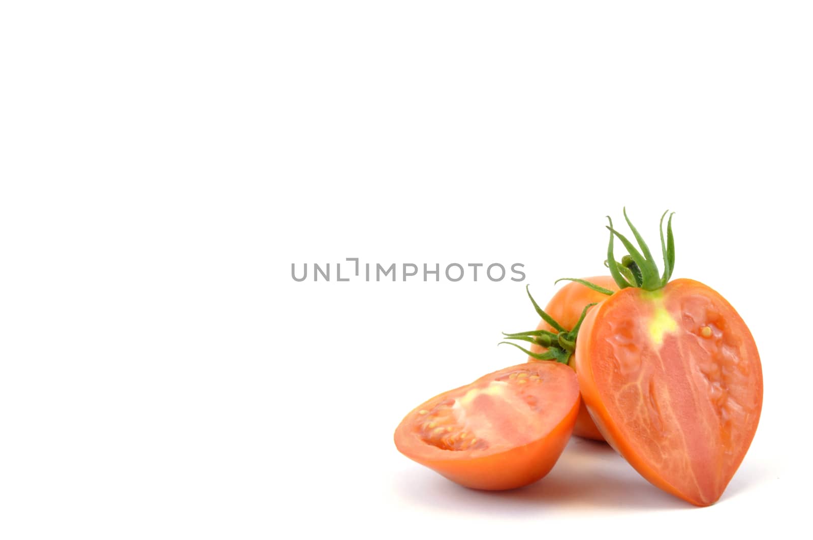 Fresh organic homegrown tomatoes on white background