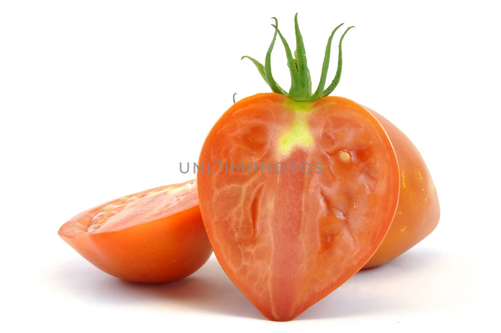 Fresh organic homegrown tomatoes on white background