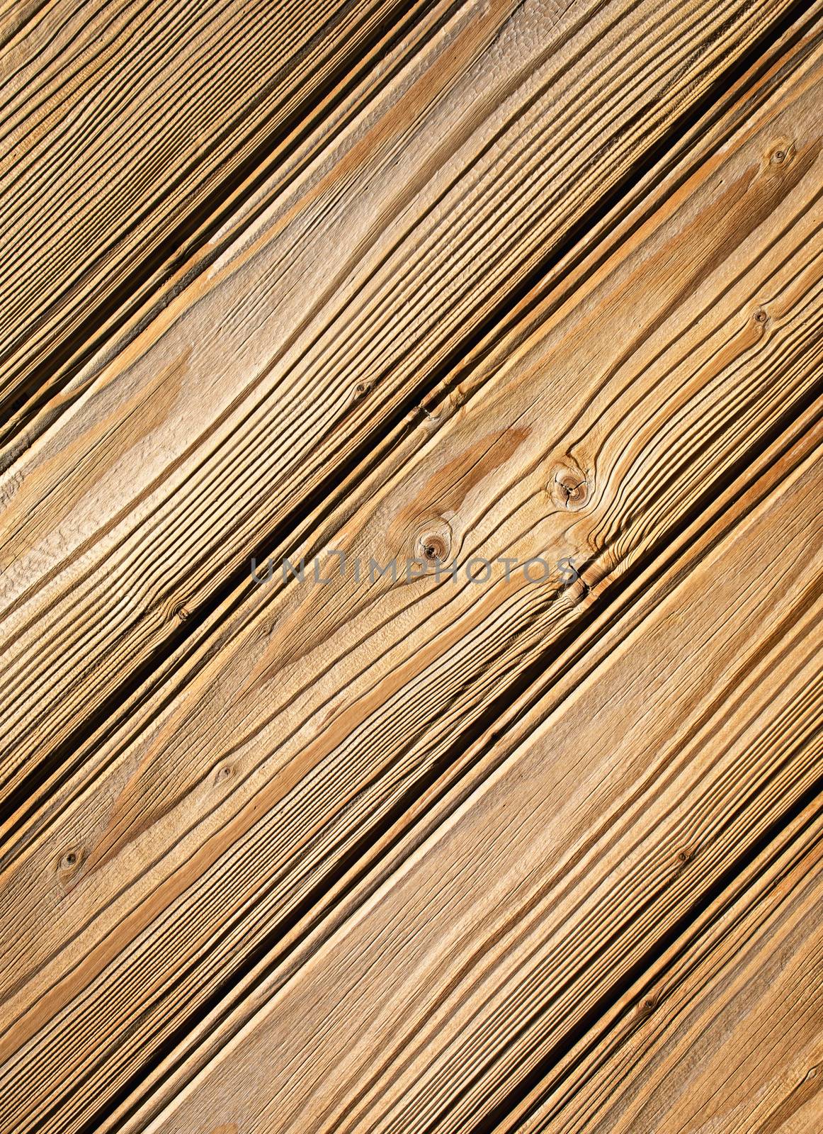 background or texture detail on wooden siding with grooved boards