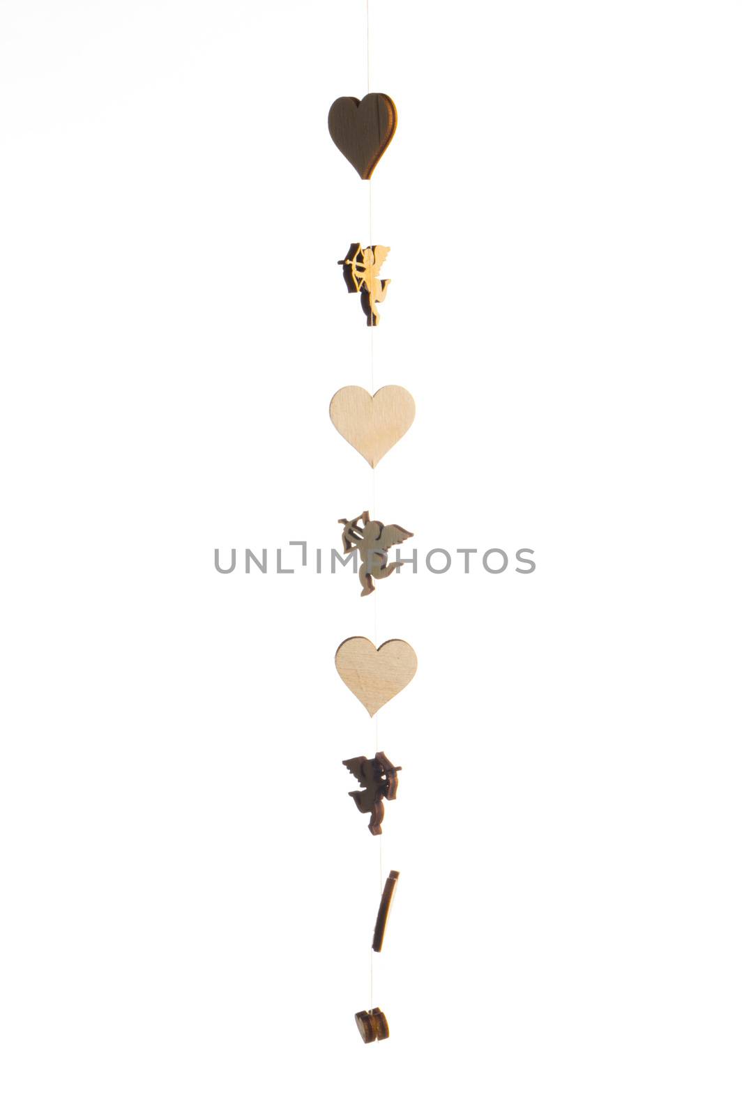 Cute wooden angel cupid and hearts decor isolated on white background, Theme of love. Valentine's day.