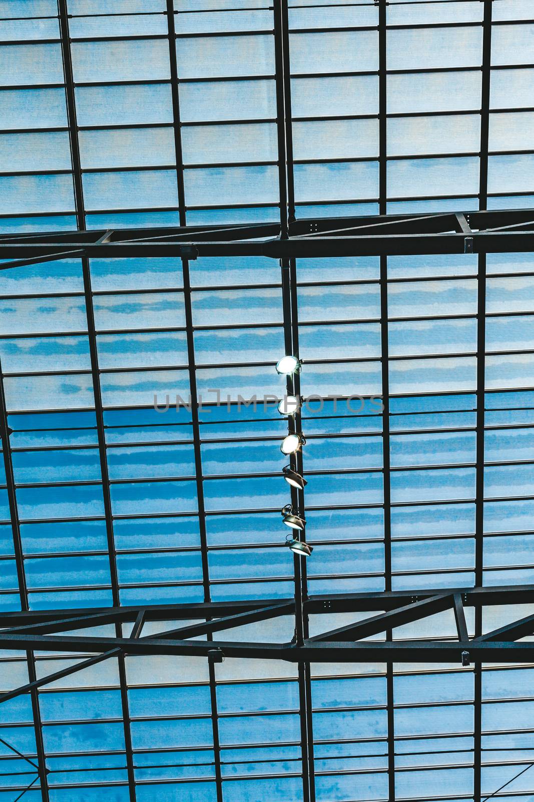 lights on a building metal structure with a window.