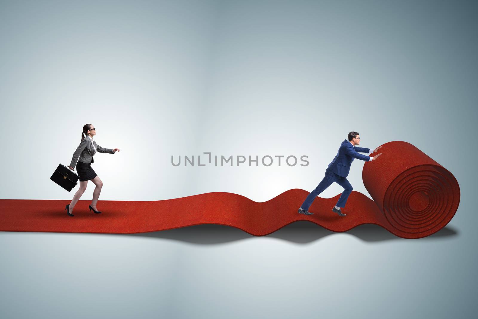 Business people in success concept with red carpet
