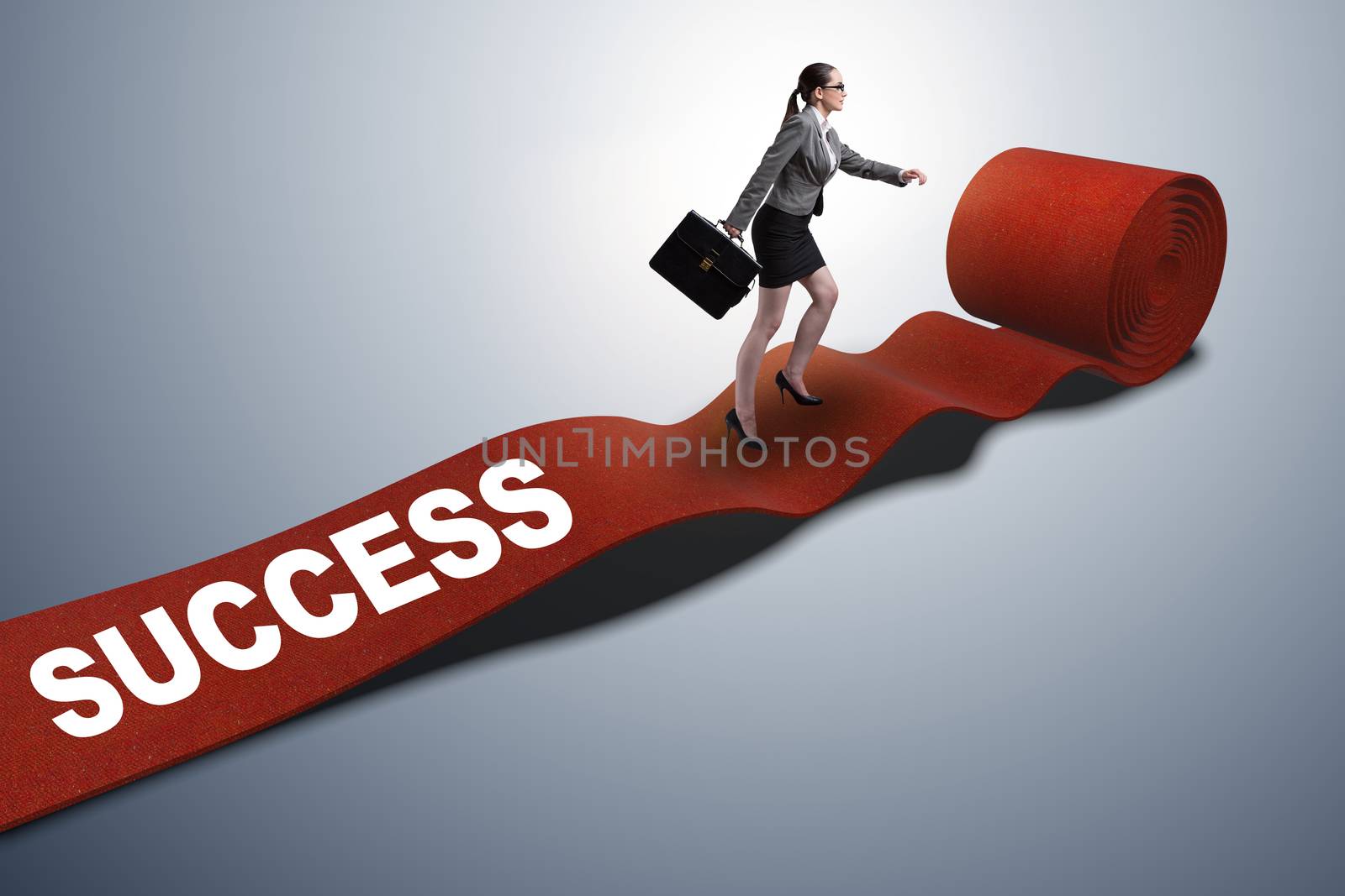 Businesswoman on the red carpet in success concept