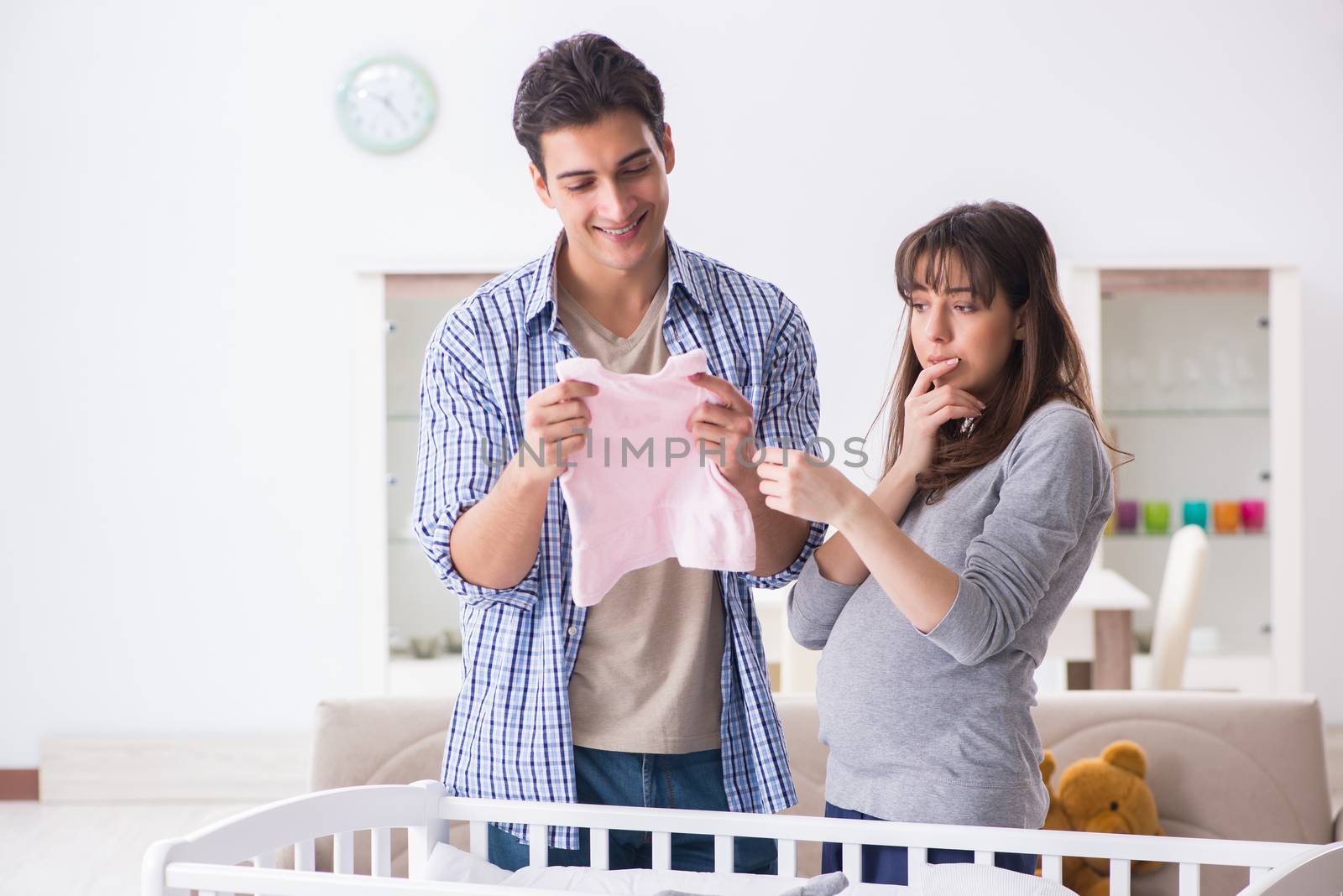 Young parents expecting their first baby