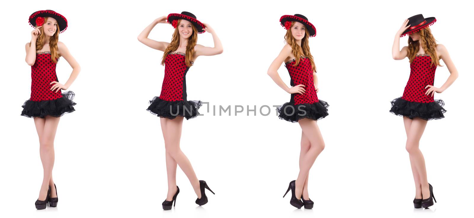 Young redhead girl in polka dot dress and  sombrero isolated on  by Elnur