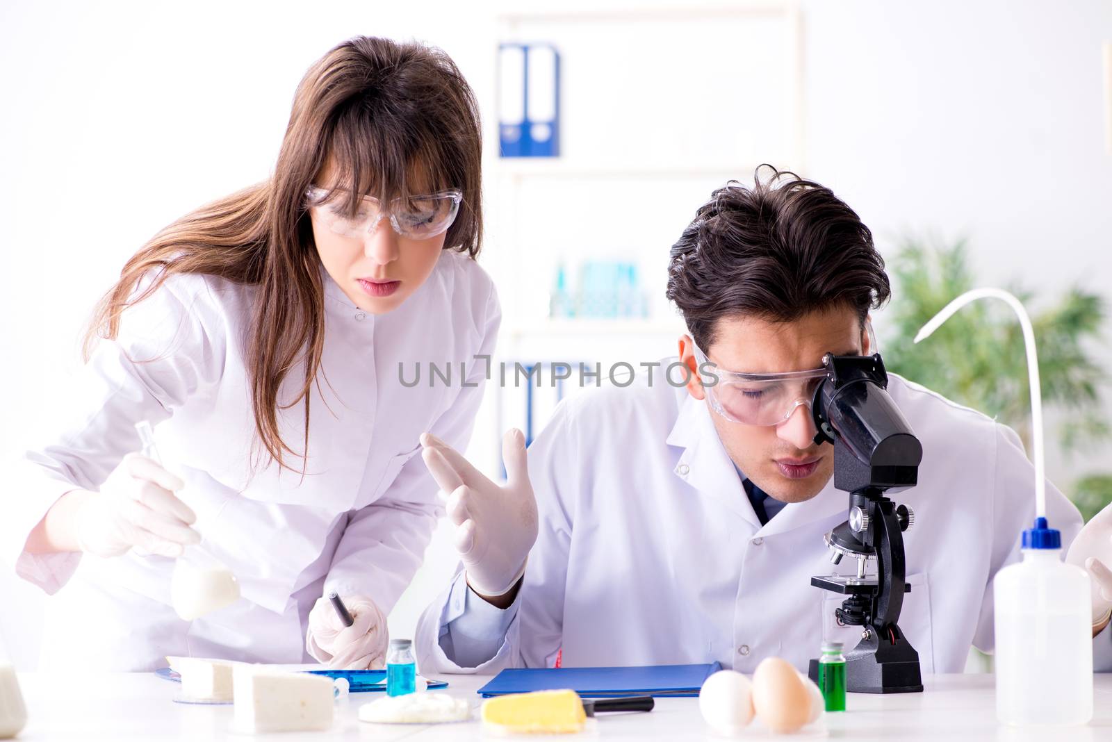 Two lab doctor testing food products