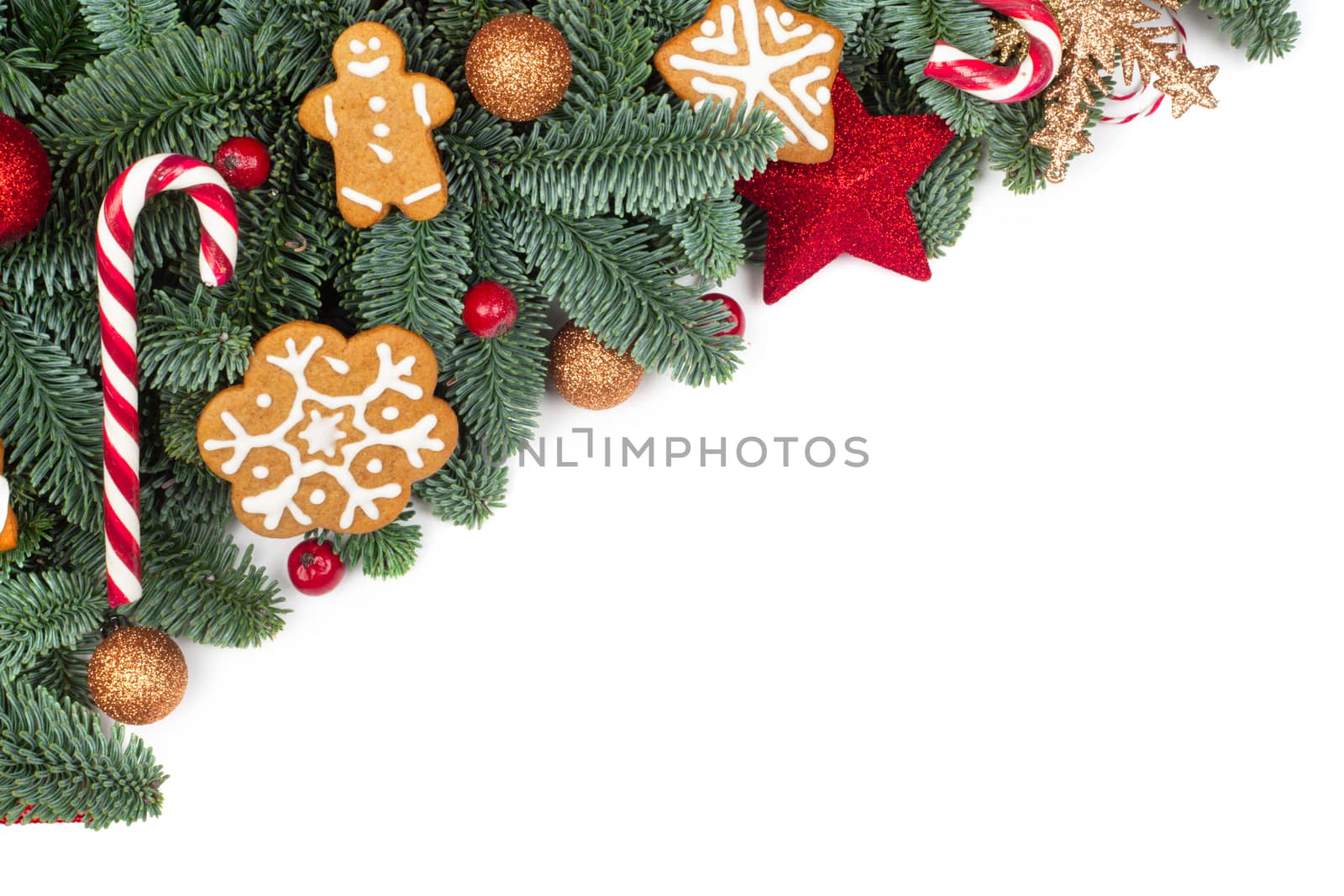 Christmas design boder frame greeting card of noble fir tree branches cookies and baubles isolated on white background