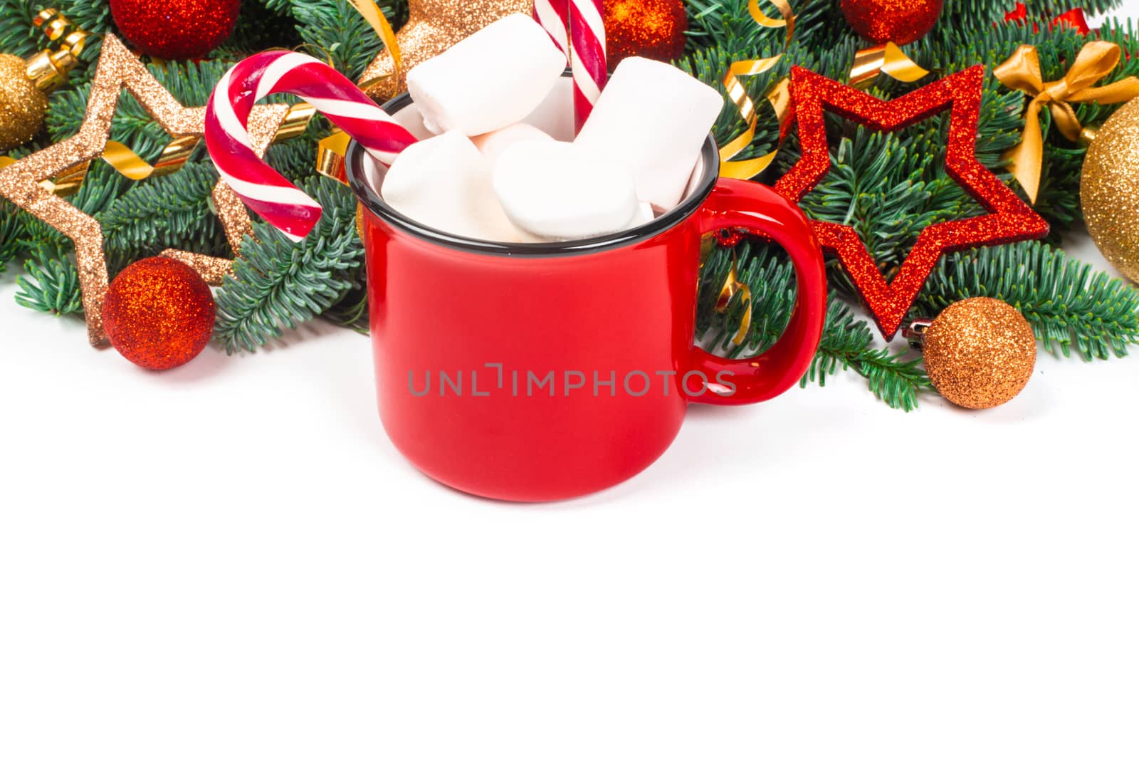 Cocoa mug and baubles on white by destillat