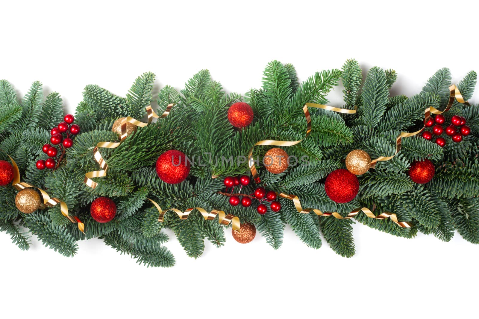 Christmas Border frame of natural noble fir tree branches red and golden baubles isolated on white background